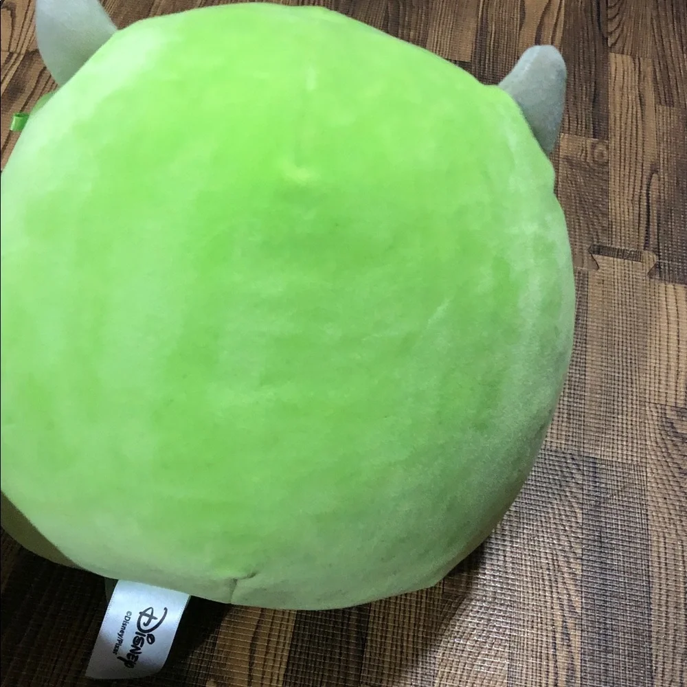 Disney Mike Wazowski Plush Pillow in Lime Green with Teal Eye.